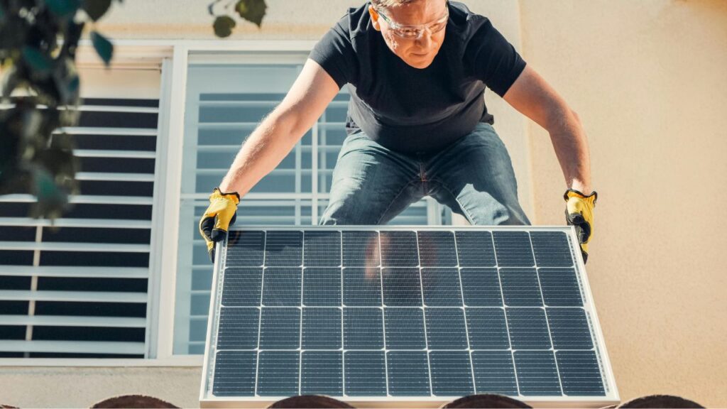 Solar panels on a UK home roof helping homeowners save money on energy bills by generating their own electricity