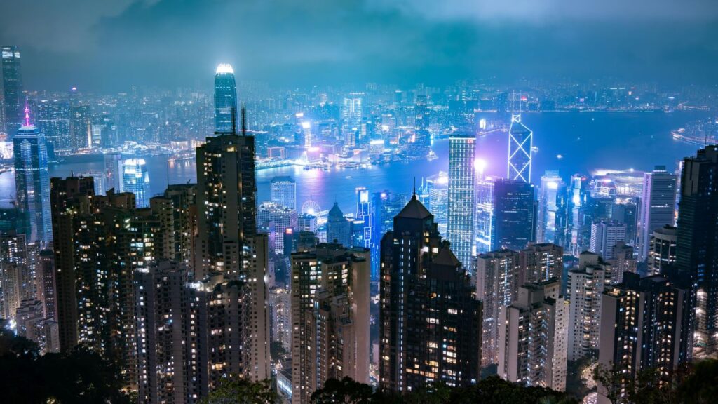 Hong Kong harbour at night reflecting Prudential shares' emerging market investment opportunity