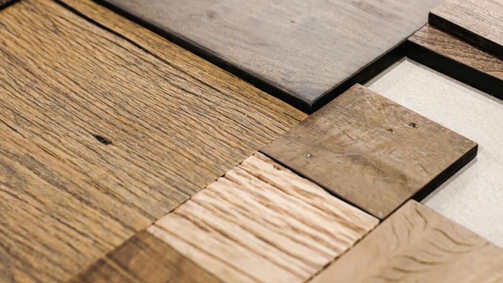 Close up of laminate flooring samples representing the core products behind Likewise Group's share price growth on the London Stock Exchange