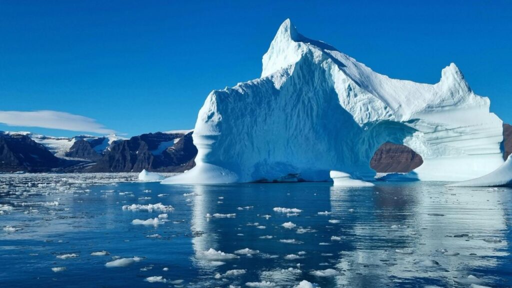Iceberg in Greenland representing rare earth mineral deposits and investment opportunities in the Arctic